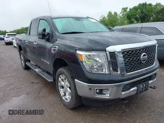 2016 Nissan Titan SL z VIN 1N6BA1F49GN513957, wystawiony jako IAAI lot #42172922 z przebiegiem 87 666 mil mil oraz . Historia ofert i sprzedaży dostępna na DreamBid. Obrazek 1.
