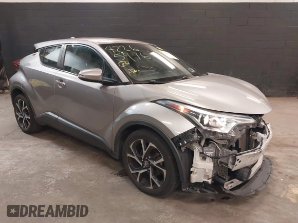 2018 Toyota C-HR XLE z VIN NMTKHMBX5JR039263, wystawiony jako IAAI lot #42265976 z przebiegiem 88 253 mil mil oraz . Historia ofert i sprzedaży dostępna na DreamBid. Obrazek 1.