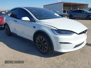 2023 Tesla Model X with VIN 7SAXCDE56PF424198, listed as a IAAI auction lot 41187814 with Not Provided miles and . Bid and sale history available at DreamBid. Image 1.