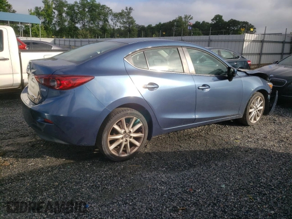 2017 Mazda 3 Touring with VIN 3MZBN1V77HM123452, listed as a Copart auction lot 57786485 with 117,811 mi miles and Salvage title. Bid and sale history available at DreamBid. Image 3.