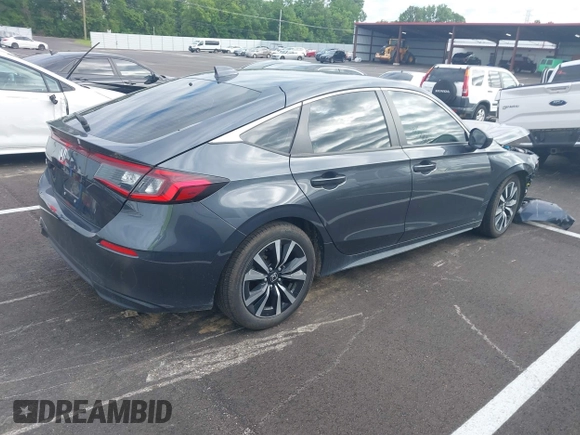 2024 Honda Civic EX-L z VIN 19XFL1H71RE009481, wystawiony jako IAAI lot #42308375 z przebiegiem 14 172 mil mil oraz . Historia ofert i sprzedaży dostępna na DreamBid. Obrazek 4.