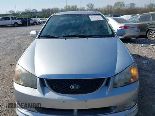 2006 Kia Spectra with VIN KNAFE161365208111, listed as a IAAI auction lot 41886193 with 292,535 mi miles. Bid and sale history available at carsss.com. Image 6.