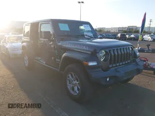 2021 Jeep Wrangler Unlimited Sport S z VIN 1C4HJXDG7MW583315, wystawiony jako IAAI lot #41827899 z przebiegiem 25 264 mil mil oraz . Historia ofert i sprzedaży dostępna na DreamBid. Obrazek 14.