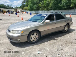 2000 Lexus ES 300 with VIN JT8BF28G9Y0277423, listed as a Copart auction lot 56523575 with 223,071 mi miles and Salvage title. Bid and sale history available at DreamBid. Image 1.