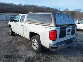 2014 Chevrolet Silverado 1500 LT with VIN 1GCVKREC2EZ361322, listed as a IAAI auction lot 41362836 with 199,684 mi miles and . Bid and sale history available at DreamBid. Image 3.