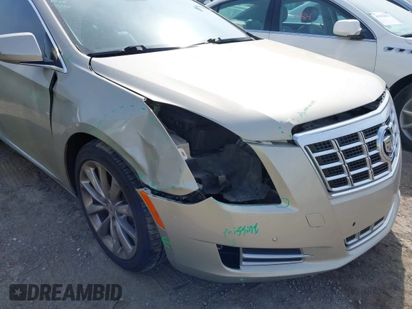 2013 Cadillac XTS Premium z VIN 2G61S5S35D9143656, wystawiony jako IAAI lot #42099511 z przebiegiem 207 055 mil mil oraz . Historia ofert i sprzedaży dostępna na DreamBid. Obrazek 6.