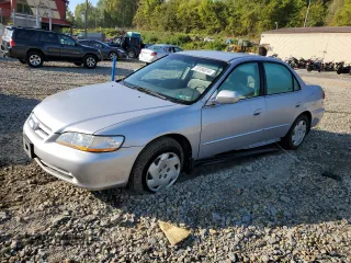 2002 Honda Accord LX z VIN 1HGCG16452A021823, wystawiony jako Copart lot #70184014 z przebiegiem 70 528 mil mil oraz Szkoda całkowita • Salvage title. Historia ofert i sprzedaży dostępna na DreamBid. Obrazek 1.
