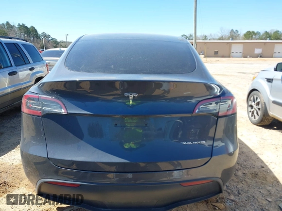 2022 Tesla Model Y Long Range with VIN 7SAYGDEE0NF387512, listed as a IAAI auction lot 41850901 with Not Provided miles and . Bid and sale history available at carsss.com. Image 16.