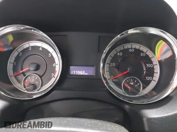 2012 Dodge Grand Caravan SXT with VIN 2C4RDGCG4CR224850, listed as a IAAI auction lot 42070300 with 177,982 mi miles and . Bid and sale history available at DreamBid. Image 7.