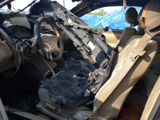 2002 Toyota Solara SE z VIN 2T1CE22P42C014139, wystawiony jako Copart lot #59381795 z przebiegiem Nie podano mil oraz Szkoda całkowita • Salvage title. Historia ofert i sprzedaży dostępna na DreamBid. Obrazek 7.