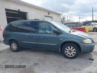 2006 Chrysler Town & Country LWB Touring with VIN 2A4GP54LX6R693048, listed as a IAAI auction lot 41887949 with 187,000 mi miles. Bid and sale history available at carsss.com. Image 13.