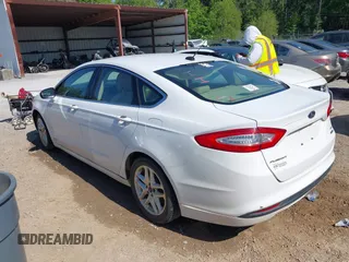 2014 Ford Fusion SE with VIN 3FA6P0HD0ER123288, listed as a IAAI auction lot 42069373 with 156,867 mi miles and . Bid and sale history available at DreamBid. Image 3.