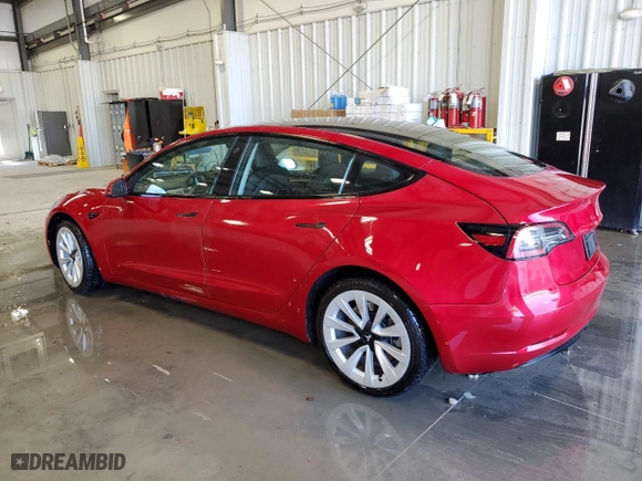 2023 Tesla Model 3 with VIN 5YJ3E1EA5PF451815, listed as a Copart auction lot 50398595 with 61,411 mi miles and Clean Title. Bid and sale history available at carsss.com. Image 2.