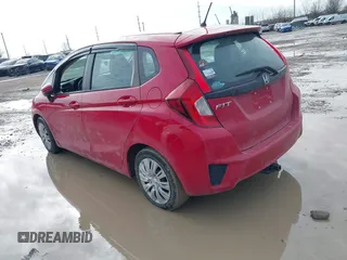2015 Honda Fit LX z VIN 3HGGK5H54FM728448, wystawiony jako IAAI lot #41538650 z przebiegiem 115 450 mil mil oraz . Historia ofert i sprzedaży dostępna na DreamBid. Obrazek 3.