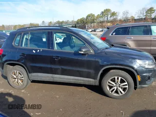 2015 Volkswagen Tiguan SE z VIN WVGAV7AX2FW593453, wystawiony jako IAAI lot #41658359 z przebiegiem 159 619 mil mil oraz . Historia ofert i sprzedaży dostępna na DreamBid. Obrazek 13.
