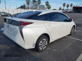 2018 Toyota Prius Two with VIN JTDKARFU1J3066710, listed as a IAAI auction lot 41636185 with 123,399 mi miles. Bid and sale history available at carsss.com. Image 4.
