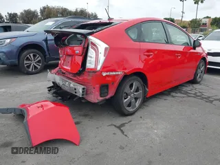 2015 Toyota Prius Four with VIN JTDKN3DU9F0400107, listed as a IAAI auction lot 42068273 with 100,915 mi miles. Bid and sale history available at carsss.com. Image 4.