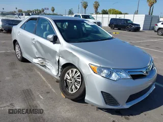 2014 Toyota Camry L with VIN 4T4BF1FK5ER442960, listed as a IAAI auction lot 42206639 with 119,639 mi miles and . Bid and sale history available at DreamBid. Image 1.