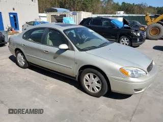 2004 Ford Taurus SEL with VIN 1FAFP56S74G186893, listed as a Copart auction lot 75484514 with 74,229 mi miles and Salvage Title. Bid and sale history available at DreamBid. Image 4.