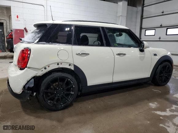 2015 MINI Cooper Hardtop 4 Door with VIN WMWXS5C52FT830741, listed as a Copart auction lot 78822444 with 103,488 mi miles and Salvage Title. Bid and sale history available at carsss.com. Image 3.