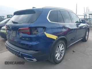 2020 BMW X5 sDrive40i with VIN 5UXCR4C07L9C27998, listed as a IAAI auction lot 41652088 with 59,009 mi miles and . Bid and sale history available at DreamBid. Image 4.