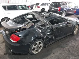 2005 Hyundai Tiburon GT z VIN KMHHN65F45U184777, wystawiony jako IAAI lot #42190342 z przebiegiem 213 013 mil mil oraz . Historia ofert i sprzedaży dostępna na DreamBid. Obrazek 6.