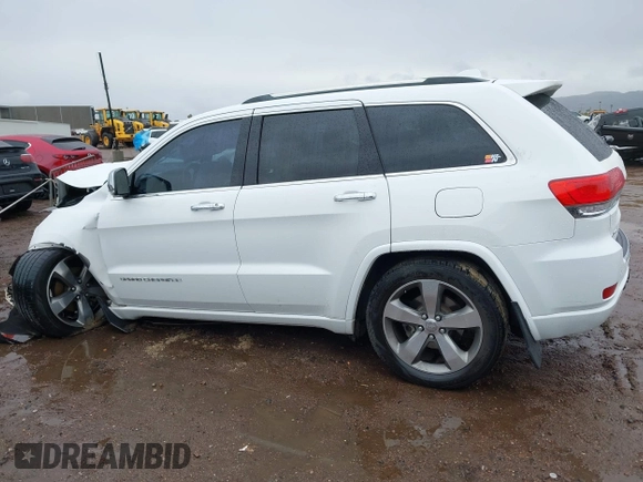 2014 Jeep Grand Cherokee Overland with VIN 1C4RJFCG9EC162098, listed as a IAAI auction lot 41746022 with 120,588 mi miles and . Bid and sale history available at DreamBid. Image 13.