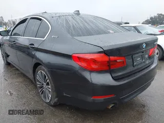 2019 BMW 5 Series 530e iPerformance with VIN WBAJA9C53KB399794, listed as a IAAI auction lot 41561874 with Not Provided miles. Bid and sale history available at carsss.com. Image 3.