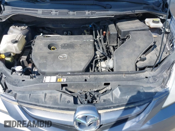 2009 Mazda Mazda5 Sport with VIN JM1CR293890352218, listed as a IAAI auction lot 42121590 with 168,302 mi miles. Bid and sale history available at carsss.com. Image 10.