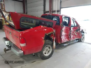 2000 Dodge Dakota Sport z VIN 1B7GG2AN5YS793828, wystawiony jako IAAI lot #41955863 z przebiegiem 267 861 mil mil oraz . Historia ofert i sprzedaży dostępna na DreamBid. Obrazek 4.