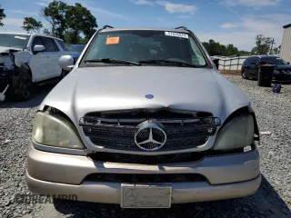 2001 Mercedes-Benz M-Class with VIN 4JGAB54EX1A271687, listed as a Copart auction lot 57046944 with 209,561 mi miles and Salvage Title. Bid and sale history available at carsss.com. Image 5.