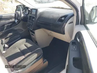 2019 Dodge Grand Caravan SE with VIN 2C4RDGBG8KR646829, listed as a IAAI auction lot 42136947 with 73,015 mi miles and . Bid and sale history available at DreamBid. Image 5.
