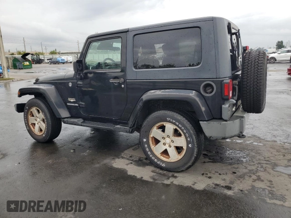 2009 Jeep Wrangler Sahara with VIN 1J4FA54109L702963, listed as a Copart auction lot 89211555 with 125,138 mi miles and Clean title. Bid and sale history available at DreamBid. Image 2.