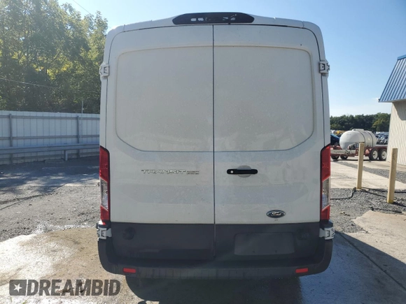 2018 Ford Transit z VIN 1FTYR2CM1JKB39451, wystawiony jako Copart lot #70852124 z przebiegiem 230 942 mil mil oraz Tytuł czysty. Historia ofert i sprzedaży dostępna na DreamBid. Obrazek 6.
