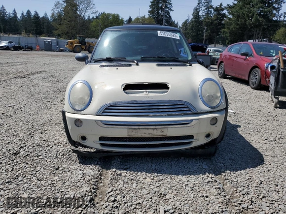 2006 MINI Hardtop with VIN WMWRC33586TJ77908, listed as a Copart auction lot 55095525 with 143,810 mi miles and Salvage title. Bid and sale history available at DreamBid. Image 5.