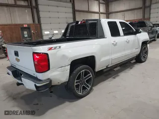 2017 Chevrolet Silverado 1500 LT with VIN 1GCVKREC4HZ266233, listed as a IAAI auction lot 41898999 with 145,503 mi miles. Bid and sale history available at carsss.com. Image 4.
