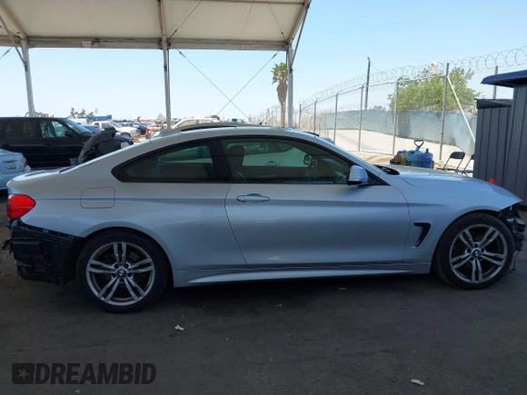 2014 BMW 4 Series 428i with VIN WBA3N7C58EF719514, listed as a IAAI auction lot 42310537 with 82,573 mi miles and . Bid and sale history available at DreamBid. Image 14.