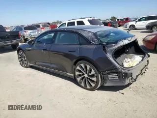 2022 Lucid Air Grand Touring z VIN 50EA1GBA8NA004844, wystawiony jako Copart lot #72620264 z przebiegiem 28 478 mil mil oraz Szkody całkowita. Historia ofert i sprzedaży dostępna na DreamBid. Obrazek 2.