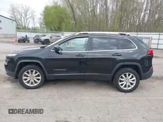 2015 Jeep Cherokee Limited with VIN 1C4PJMDB9FW680565, listed as a IAAI auction lot 42134052 with 192,728 mi miles. Bid and sale history available at carsss.com. Image 14.