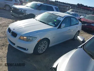 2011 BMW 3 Series 328i with VIN WBAPH7C57BE675578, listed as a IAAI auction lot 41844032 with 57,324 mi miles. Bid and sale history available at carsss.com. Image 2.