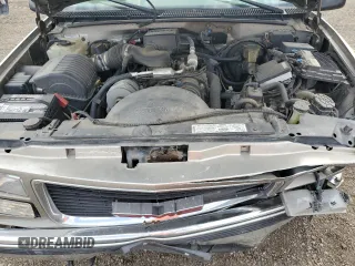 1999 GMC Yukon with VIN 1GKEK13R9XJ787877, listed as a Copart auction lot 72185044 with 191,710 mi miles and Salvage Title. Bid and sale history available at carsss.com. Image 12.