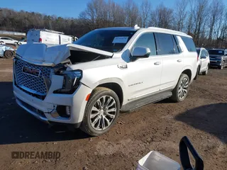 2021 GMC Yukon Denali with VIN 1GKS2DKL2MR458128, listed as a IAAI auction lot 41343876 with 64,732 mi miles. Bid and sale history available at carsss.com. Image 2.