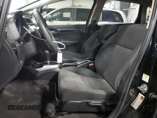 2015 Honda Fit EX-L z VIN 3HGGK5H88FM721318, wystawiony jako Copart lot #56717255 z przebiegiem 107 235 mil mil oraz Szkoda całkowita • Salvage title. Historia ofert i sprzedaży dostępna na DreamBid. Obrazek 7.