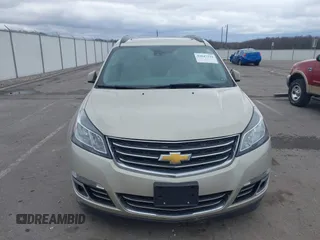 2015 Chevrolet Traverse LTZ z VIN 1GNKRJKD6FJ237851, wystawiony jako IAAI lot #41847524 z przebiegiem 84 809 mil mil oraz . Historia ofert i sprzedaży dostępna na DreamBid. Obrazek 12.