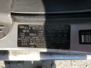 2004 Kia Spectra z VIN KNAFB121145308252, wystawiony jako Copart lot #53377555 z przebiegiem 206 439 mil mil oraz Szkoda całkowita • Salvage title. Historia ofert i sprzedaży dostępna na DreamBid. Obrazek 12.