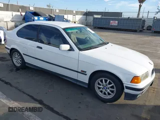 1996 BMW 3-Series 318TI with VIN WBACG8324TAU36317, listed as a IAAI auction lot 41489402 with 139,956 mi miles. Bid and sale history available at carsss.com. Image 1.