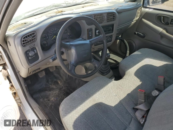 2000 Isuzu Hombre S z VIN 1GGCS1444Y8701114, wystawiony jako Copart lot #74325664 z przebiegiem 210 803 mil mil oraz Szkody całkowita. Historia ofert i sprzedaży dostępna na DreamBid. Obrazek 8.