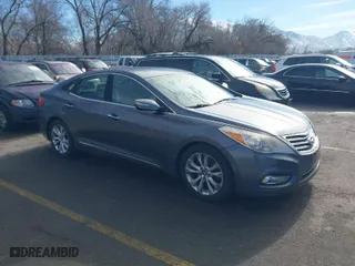 2012 Hyundai Azera with VIN KMHFG4JG9CA149848, listed as a IAAI auction lot 41658387 with 164,933 mi miles. Bid and sale history available at carsss.com. Image 1.