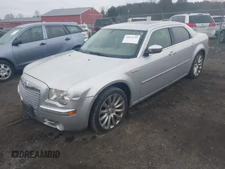 2009 Chrysler 300 with VIN 2C3LA63T89H622085, listed as a IAAI auction lot 41872519 with 151,543 mi miles. Bid and sale history available at carsss.com. Image 2.
