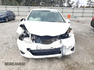 2012 Toyota Yaris L with VIN JTDKTUD30CD528470, listed as a Copart auction lot 79952414 with 157,062 mi miles and Salvage Title. Bid and sale history available at DreamBid. Image 5.